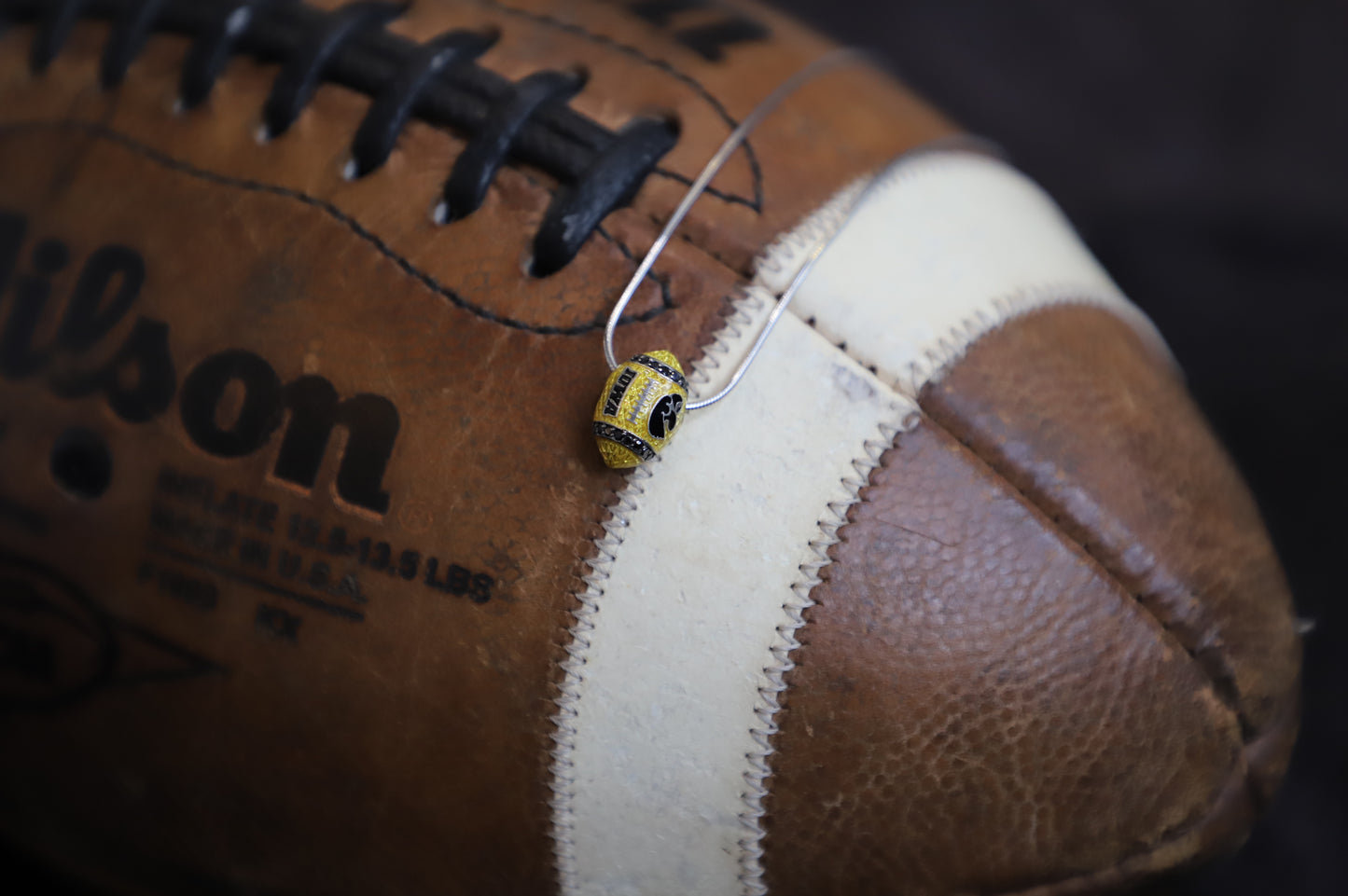 Iowa Black Diamond and Silver Football Pendant