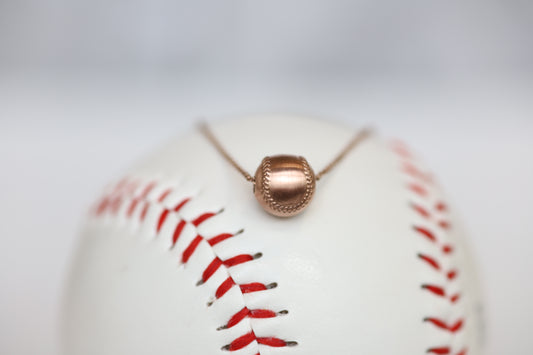 14k yellow gold softball pendant