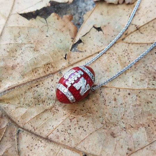Nebraska Huskers White Gold and Diamond Football Pendant