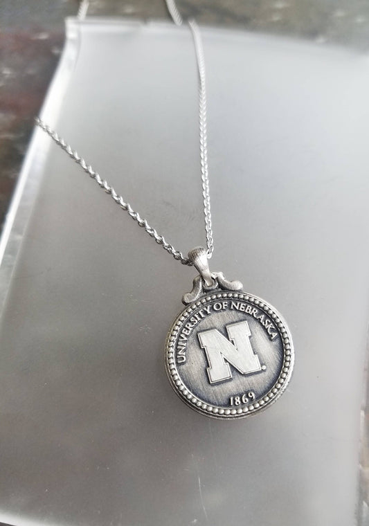 Nebraska Cornhuskers Antique Pendant