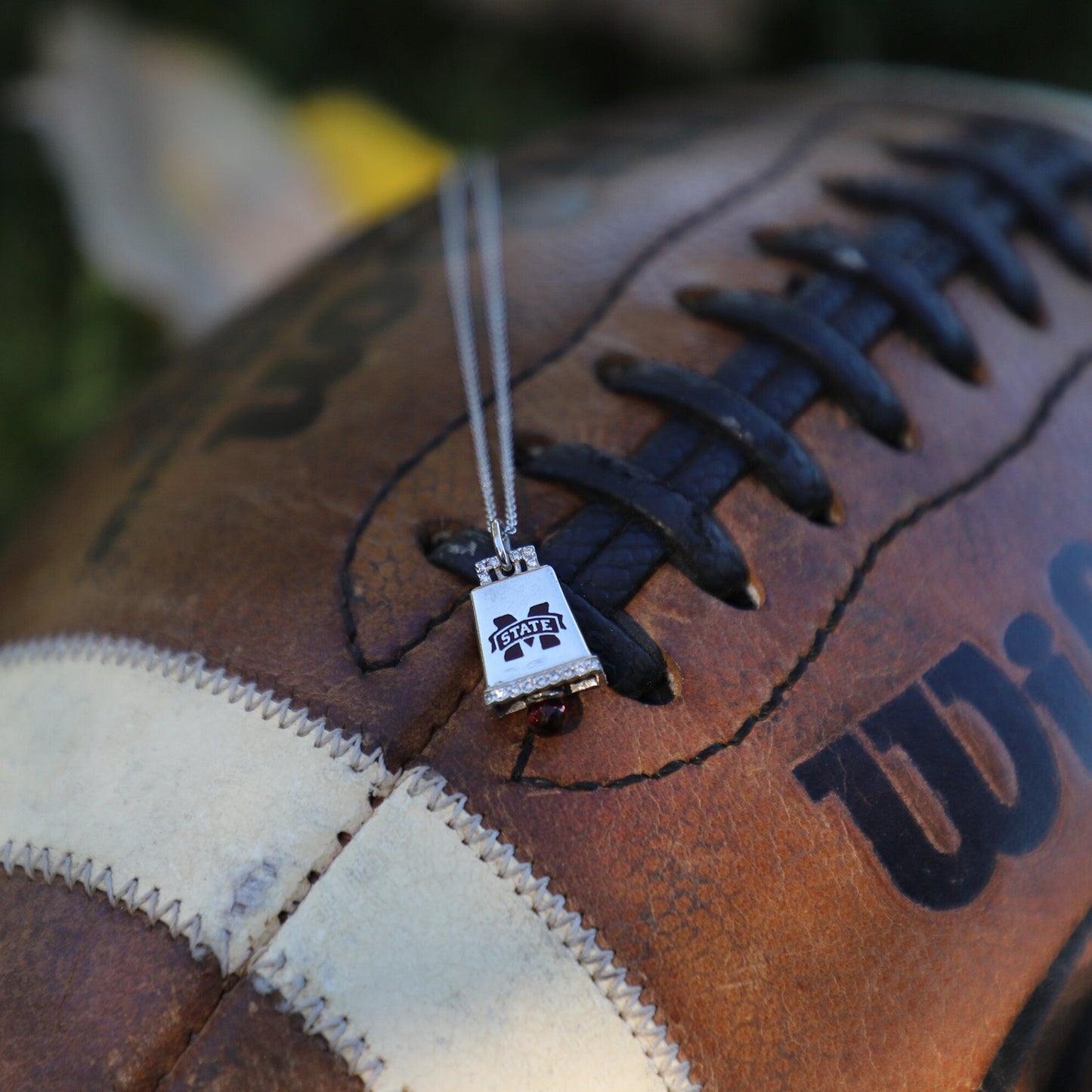 Mississippi State Bulldogs Cowbell Pendant in 14k White Gold with Diamonds & Garnet