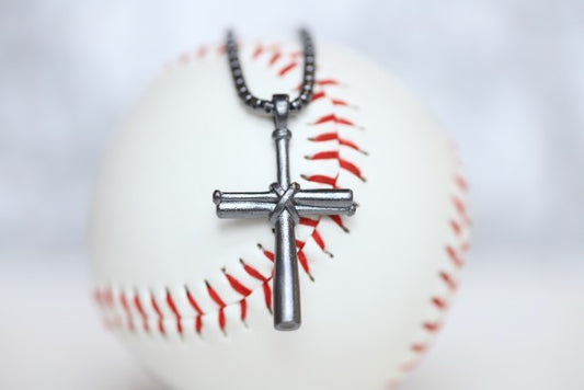 Our largest baseball cross pendant! Perfect for making a statement! Product Details Sterling silver cross pendant Sterling silver rounded box chain Lobster clasp Choose from 22" or 24" Necklace box included Men Boys Dad Father Day Gift Groomsmen Best Man Baseball Cross Pendant Necklace