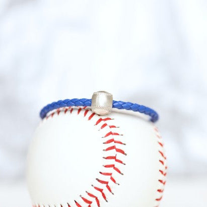 Customize your own baseball leather bracelet! Product Details Sterling silver lobster clasp Fine Italian leather Choose from sterling silver baseball Choose bracelet length (Average size for women is 7")