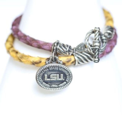 Finish off your LSU game day look with our purple and gold leather charm bracelet. Features: Sterling silver Toggle clasp Stingray leather Double sided charm Officially licensed product football baseball soccer volleyball cheer mom dad father wedding gift present men women Louisiana State university purple gold yellow tigers leather lsu lsu lsu