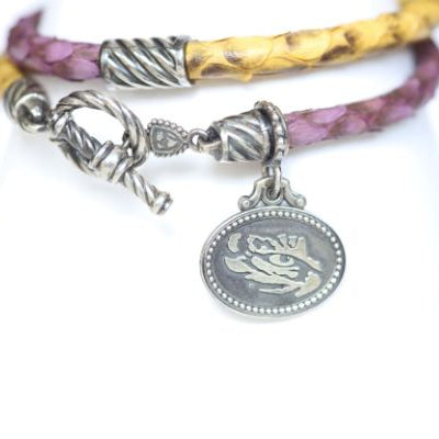 Perfect for any season! Each Mother of Pearl is one-of-a-kind. Features: Sterling silver Mother of pearl with purple enamel inlay Lobster clasp Pendant: 22x22mm LSU Louisiana State University Football Baseball Soccer Volleyball Track Graduate Grad Graduation Mom Dad Mother Father Wedding Gift Present Tigers Geaux Baton Rouge