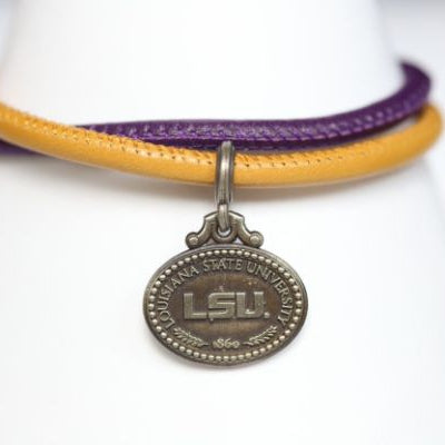 Perfect for any season! Each Mother of Pearl is one-of-a-kind. Features: Sterling silver Mother of pearl with purple enamel inlay Lobster clasp Pendant: 22x22mm LSU Louisiana State University Football Baseball Soccer Volleyball Track Graduate Grad Graduation Mom Dad Mother Father Wedding Gift Present Tigers Geaux Baton Rouge