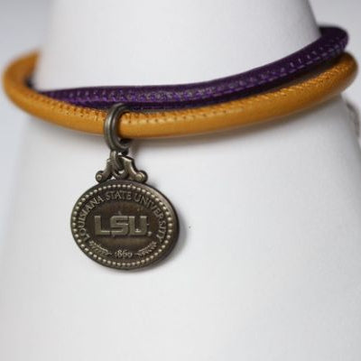 Perfect for any season! Each Mother of Pearl is one-of-a-kind. Features: Sterling silver Mother of pearl with purple enamel inlay Lobster clasp Pendant: 22x22mm LSU Louisiana State University Football Baseball Soccer Volleyball Track Graduate Grad Graduation Mom Dad Mother Father Wedding Gift Present Tigers Geaux Baton Rouge