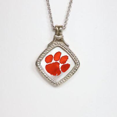 Made for the biggest Clemson fan! This is a one-of-a-kind piece. Features: Amethyst accents Man made opal center 14k gold Cable chain with lobster clasp 18" chain Officially licensed product Pendant box included