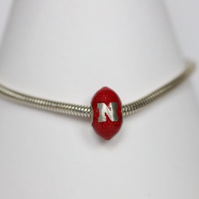 Nebraska Enameled Football Charm only