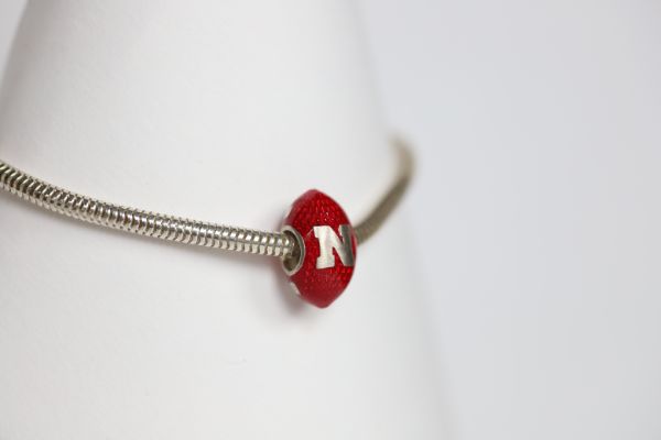 Nebraska Enameled Football Charm only