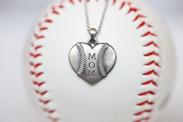 This one is for the biggest fan, the one who doesn't ever miss a game and proudly sports her favorite players number win or lose. This one is for you, Mom!   Product Details  Features Mom engraving Sterling silver Sterling silver cable chain Lobster clasp Pendant: 22mm﻿ Necklace box included