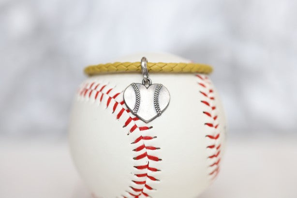 Customize your own Baseball Heart  leather bracelet!  ﻿Product Details  Sterling silver lobster clasp Fine Italian leather Choose from sterling silver baseball or baseball heart charm ﻿Choose bracelet length (Average size for women is 7")