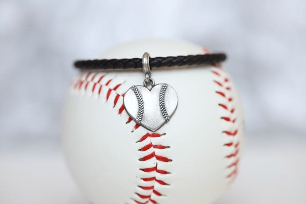 Customize your own Baseball Heart  leather bracelet!  ﻿Product Details  Sterling silver lobster clasp Fine Italian leather Choose from sterling silver baseball or baseball heart charm ﻿Choose bracelet length (Average size for women is 7")