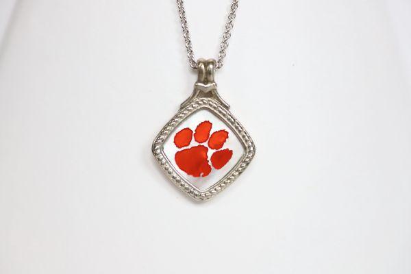 Made for the biggest Clemson fan! This is a one-of-a-kind piece.   Features:  Amethyst accents Man made opal center 14k gold Cable chain with lobster clasp 18" chain Officially licensed product  Pendant box included
