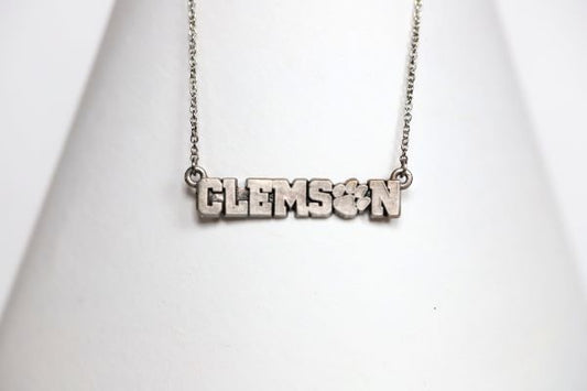 Celebrate the 2016 Clemson Tigers Football National Championship victory!  Features:  Sterling silver Purple and yellow enamel Lobster clasp Officially licensed product Pendant box included